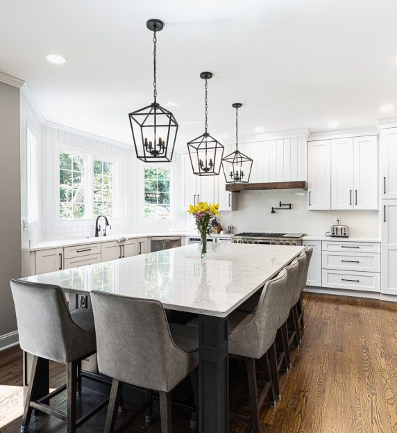 LBK 2024 CotY award kitchen remodel older home layout reconfigured, mixed quartz & shiplap backsplash, warm wood flooring